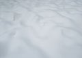 Uneven white snow surface on the ground Royalty Free Stock Photo