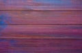 Unevenly colored purple wooden board