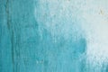 Unevenly colored wall with spots. Painted wall texture.Blue abstract background