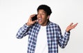 Unexpected call. Surprised guy talking on phone Royalty Free Stock Photo