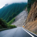 Unexpected rock fall creates dangerous road conditions