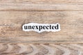 unexpected text on paper. Word unexpected on torn paper. Concept Image Royalty Free Stock Photo