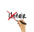 Unfair - male hand writing text on white background Royalty Free Stock Photo