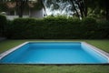 unfenced swimming pool in a residential area Royalty Free Stock Photo