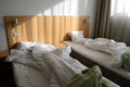 Unfilled bed in motel room Royalty Free Stock Photo