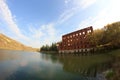Unfinished abandoned building on the river Vorgol, Russia, fisheye effect Royalty Free Stock Photo