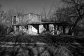 Unfinished, abandoned and ruined building in black and white