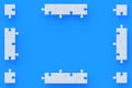 Unfinished blank jigsaw puzzle pieces on blue background. Flat lay. Copy space