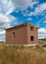 Unfinished brick cottage in the village Royalty Free Stock Photo