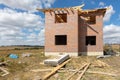 Unfinished brick cottage in the village Royalty Free Stock Photo