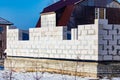 Unfinished brick house in the cottage in winter