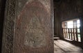 An unfinished carving of Apsara on a sandstone pillar in Angkor Wat. in Siem Reap