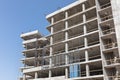 Unfinished concrete building under construction on blue sky Royalty Free Stock Photo