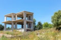 Unfinished concrete house in rural Greece