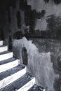 Unfinished concrete stairway steps in a building