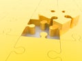 Unfinished gold puzzle on white Royalty Free Stock Photo