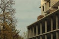 Unfinished high-rise building, crane, architecture. Royalty Free Stock Photo