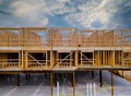 Unfinished of interior view of a house residential construction framing against Royalty Free Stock Photo