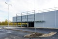 Unfinished metal frame warehouse building facade covered with thermally insulated sandwich panels Royalty Free Stock Photo