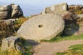 An unfinished millstone lays abandoned on Surprise View in Derbyshire