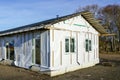 Unfinished modern one-story wood-frame residential house before facade finishing