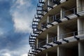 Unfinished part of a building. Construction site with part of a residential building or commercial property under a blue sky Royalty Free Stock Photo