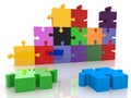 Unfinished wall from colored puzzle pieces Royalty Free Stock Photo