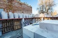 Unfinished wall made from foamed concrete block during the building house on the construction site