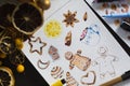 Unfinished watercolor painting of gingerbread cookies, gingerbread men