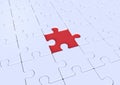 Unfinished white jigsaw puzzle on blue background Royalty Free Stock Photo