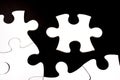 Unfinished white jigsaw puzzle pieces Royalty Free Stock Photo
