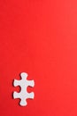 Unfinished white jigsaw puzzle pieces on red background Royalty Free Stock Photo