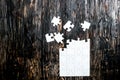 Unfinished white puzzle with missing pieces Royalty Free Stock Photo