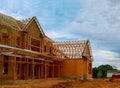 Unfinished wood frame building or framing beam of new house Royalty Free Stock Photo