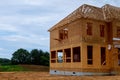 Unfinished wood frame building or framing beam of new house Royalty Free Stock Photo