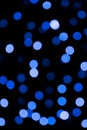 Unfocused abstract colourful bokeh black background. defocused and blurred many round blue light