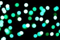 Unfocused abstract colourful bokeh black background. defocused and blurred many round blue light Royalty Free Stock Photo