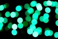 Unfocused abstract colourful bokeh black background. defocused and blurred many round blue light Royalty Free Stock Photo