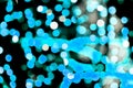 Unfocused abstract colourful bokeh black background. defocused and blurred many round blue light Royalty Free Stock Photo
