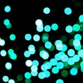 Unfocused abstract colourful bokeh black background. defocused and blurred many round blue light Royalty Free Stock Photo