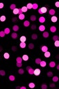 Unfocused abstract colourful bokeh purple background. defocused and blurred many round purple light Royalty Free Stock Photo