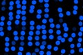 Unfocused abstract dark blue bokeh on black background. defocused and blurred many round light Royalty Free Stock Photo