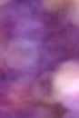 Unfocused blurred lavender, lilac soft abstract rotating background wallpaper. Blured sun light.The light of distant space. Cosmic