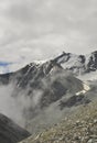 Unfocused Glacier view in Darcha-Padum road with clouds and fogg in summer season.