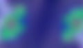 Unfocused green-blue background. Blurred lines and spots.