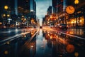 An unfocused image of an urban road at nighttime, filled with moving cars and a clock-bearing structure on the Royalty Free Stock Photo