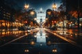 An unfocused image of an urban road at nighttime, filled with moving cars and a clock-bearing structure on the Royalty Free Stock Photo