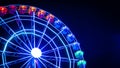 Night photo of a moving illuminated Ferris wheel in Madrid, Spain Royalty Free Stock Photo