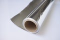 Unfolded aluminum foil on roll Royalty Free Stock Photo