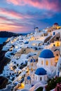 Unforgettable sunset of Santorini, with romantic ambience, iconic whitewashed buildings, cobalt-blue domes, sea, cliffs, travel Royalty Free Stock Photo